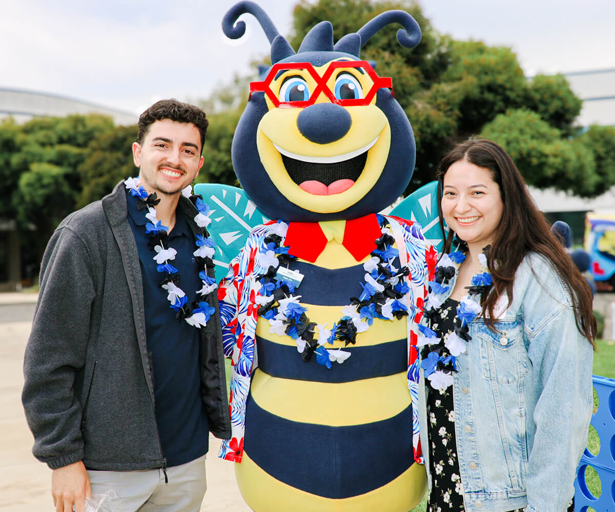 KGI beaker bee at summer bash with students