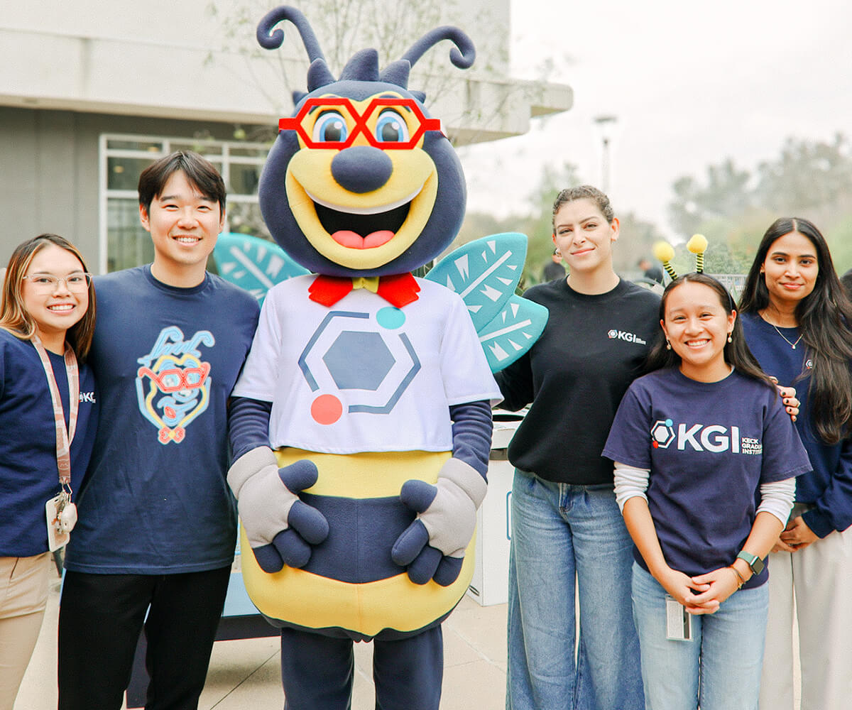KGI beaker bee with students