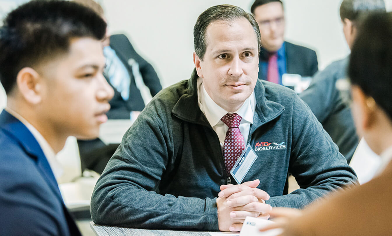 KGI students with advisor