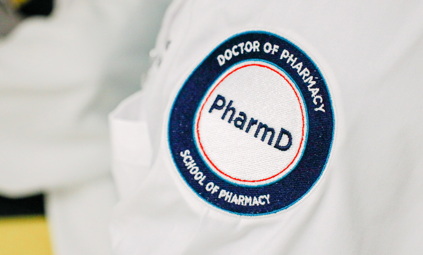 KGI Pharmd white coat
