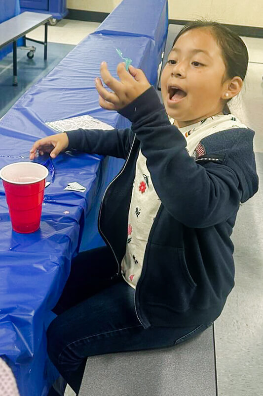 Kid at STEM event