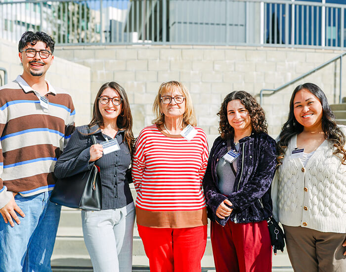 Nicole Bournias-Vardiabasis (center) with CSUSB students